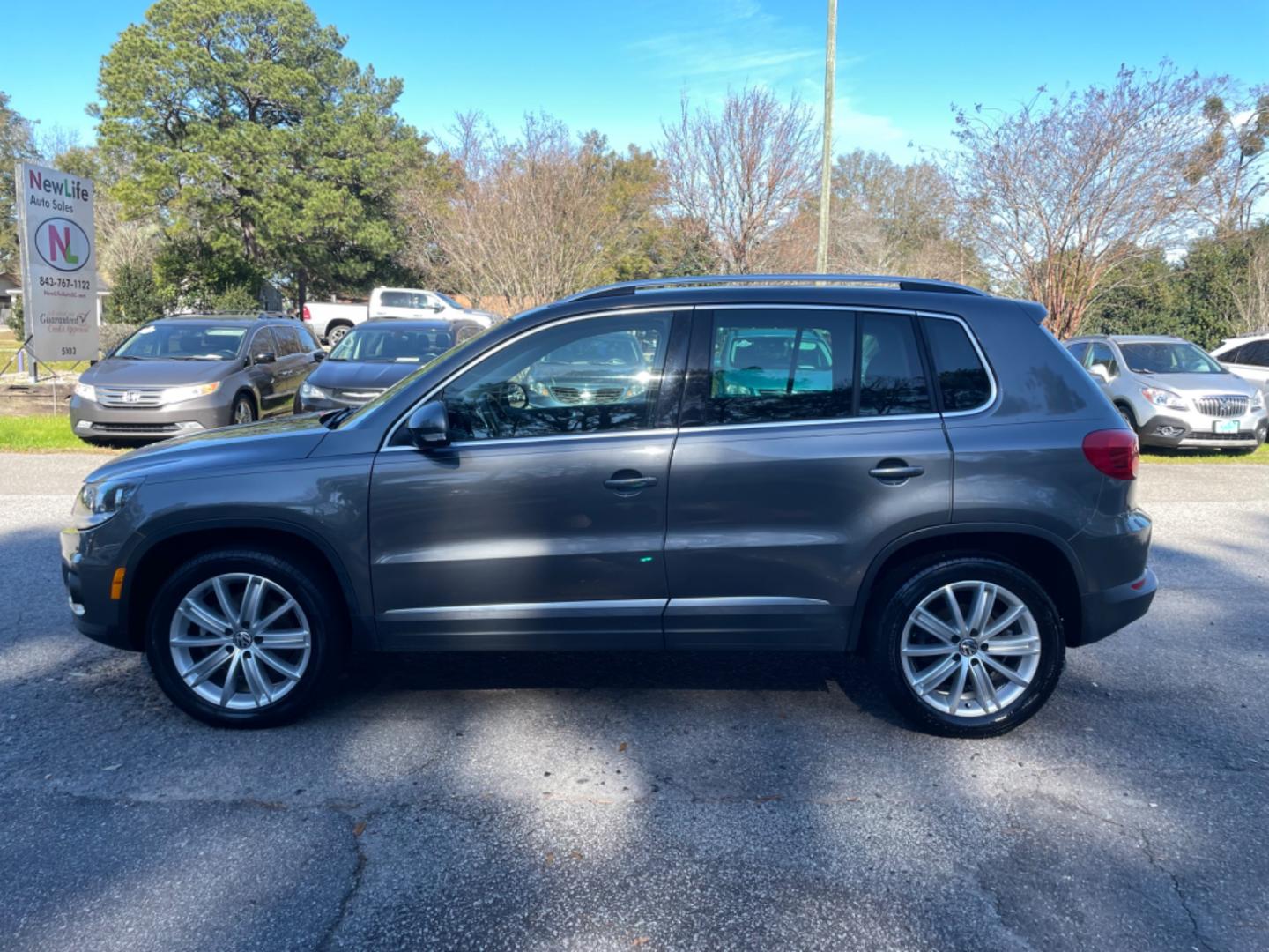 2015 GRAY VOLKSWAGEN TIGUAN S (WVGAV7AX3FW) with an 2.0L engine, Automatic transmission, located at 5103 Dorchester Rd., Charleston, SC, 29418-5607, (843) 767-1122, 36.245171, -115.228050 - Photo#4